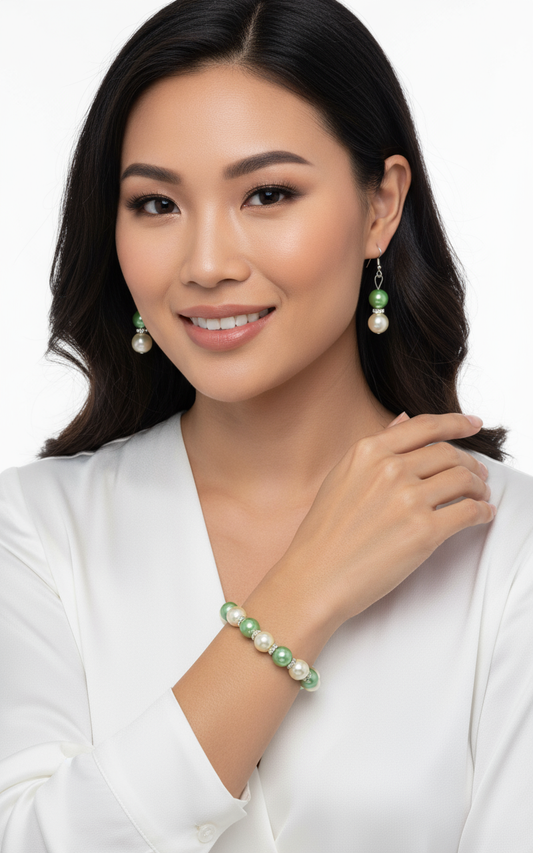 Asian model wearing green and white pearl jewelry set