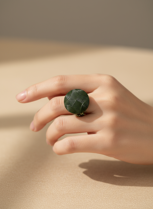 Chinese model wearing green beaded button ring