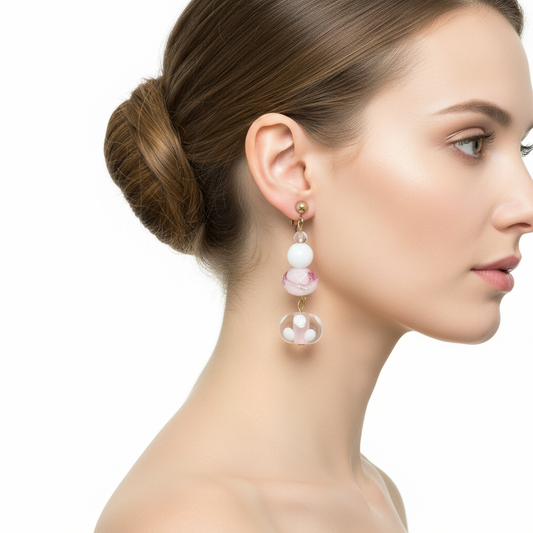 Model wearing pink flower glass bead clip-on earrings