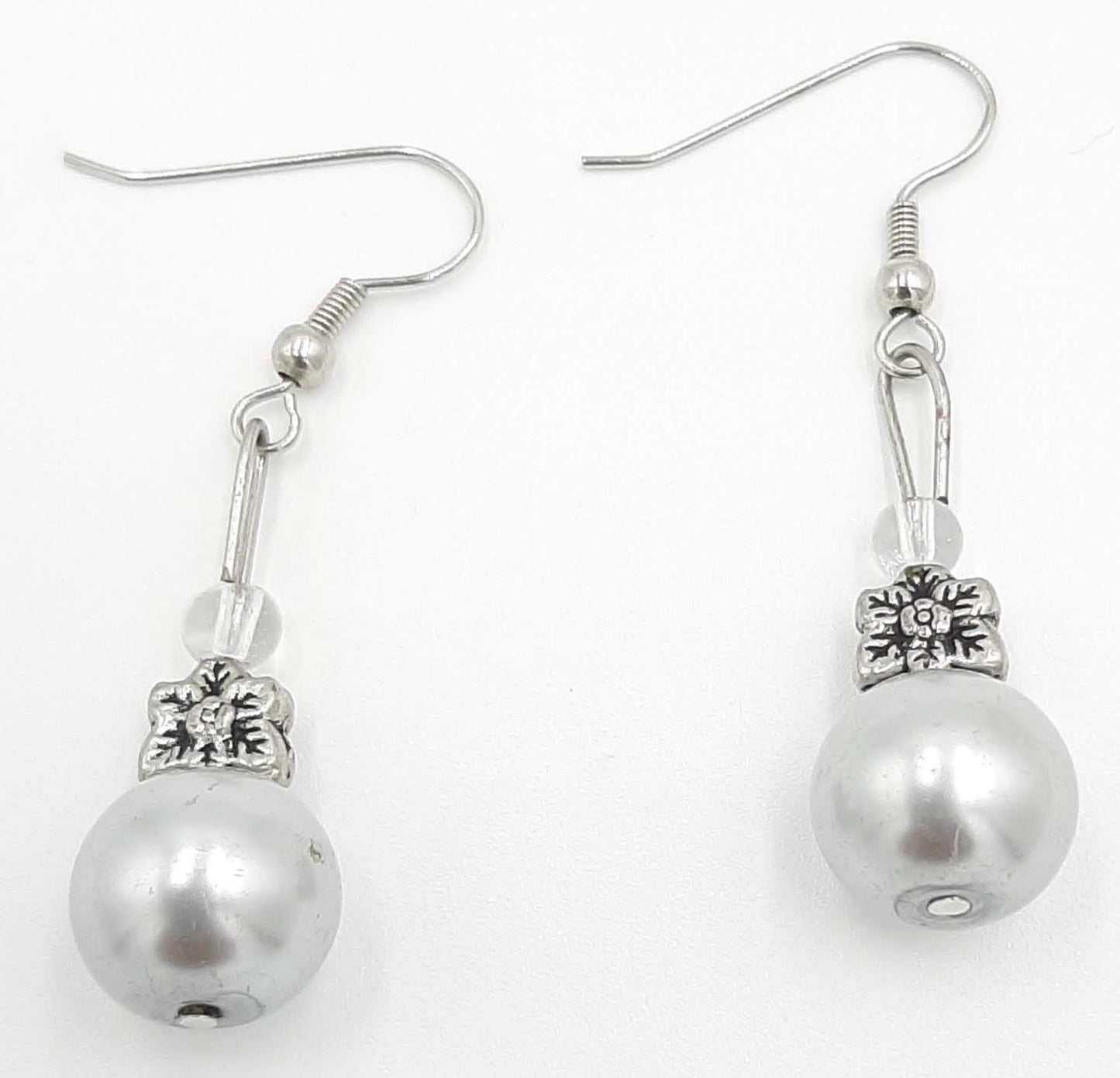 Elegant White Pearl Drop Earrings with Silver Flower Accent