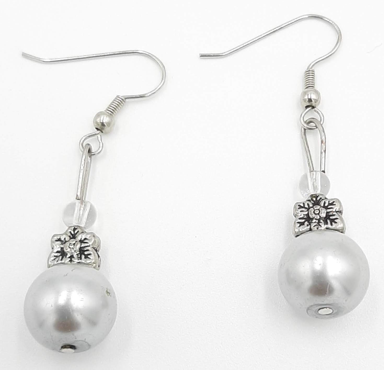 Elegant White Pearl Drop Earrings with Silver Flower Accent