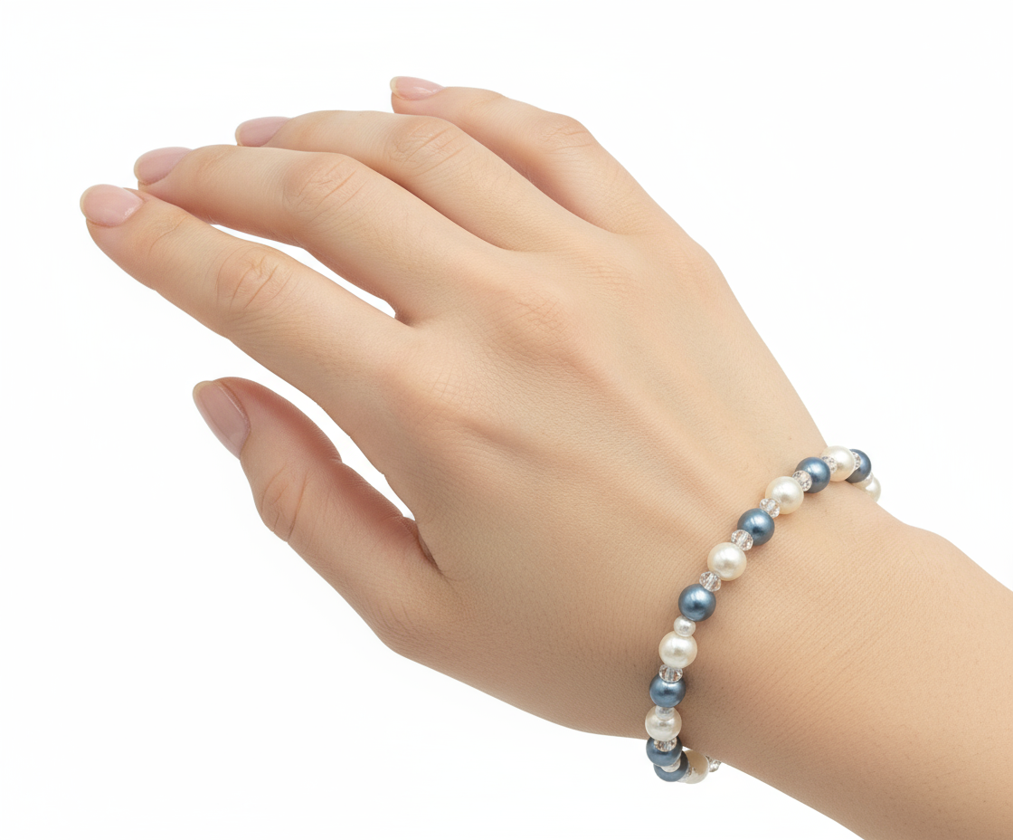 Model wearing blue and white pearl bracelet